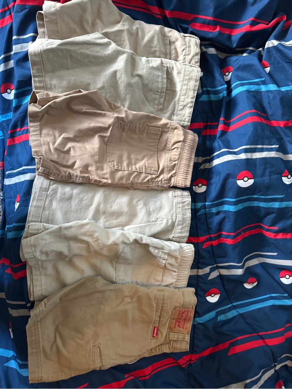 Boys khaki uniform shorts size 8. 3 old navy, 2 Walmart, 1 Levi’s brand